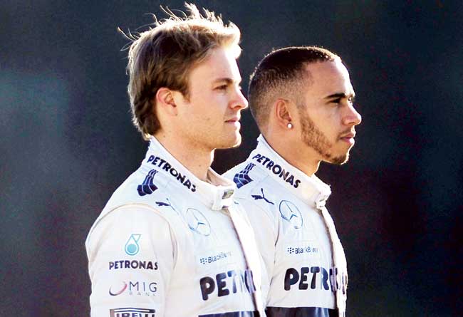 Mercedes drivers Nico Rosberg (left) and Lewis  Hamilton. Pic/Getty Images