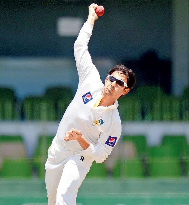 A file photo of Pakistan spinner Saeed Ajmal, who was suspended with immediate effect by the International Cricket Council ICC on September 9 after his bowling action was found to be illegal following tests that were carried out in Brisbane, Australia in August. Pic/AFP