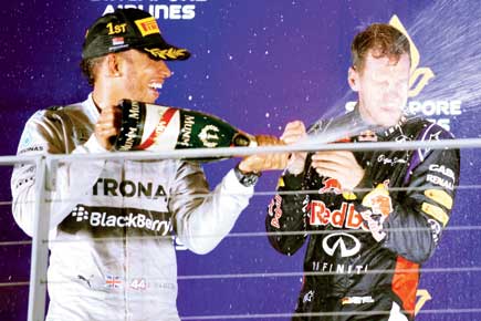 F1: Lewis Hamilton wins Singapore GP to lead title race