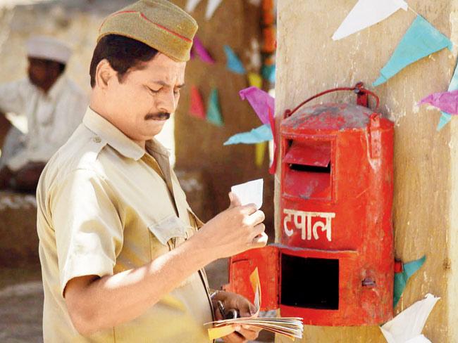 A still from Tapaal that tells the story of a postman who visits a  remote village