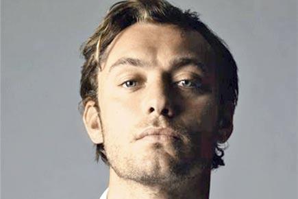 Stories in tabloids don't affect Jude Law anymore