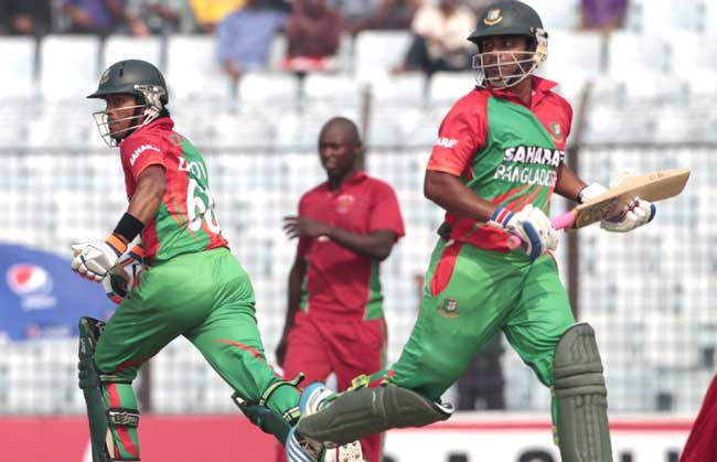 Bangladesh cricketers Tamim Iqbal (R) and Anamul Haque (L) run between the wicket during the second one-day international (ODI) match between Bangladesh and Zimbabwe at The Zahur Ahmed Chowdhury Stadium in Chittagong. Pic/AFP