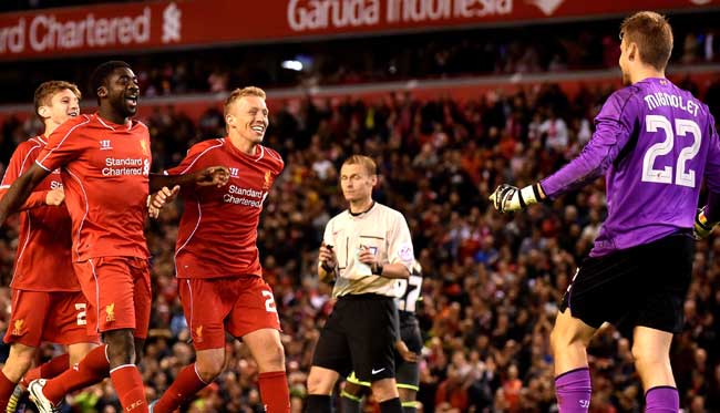 Liverpool players celebrate with Belgian goalkeeper Simon Mignolet R after their 14-13 penalty shoot out victory in the English League Cup third round football match between Liverpool and Middlesbrough at Anfield in Liverpool, north west England. Pic/AFP