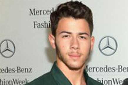 Father proud of Nick Jonas' raunchy 'crotch-grabbing' magazine shoot