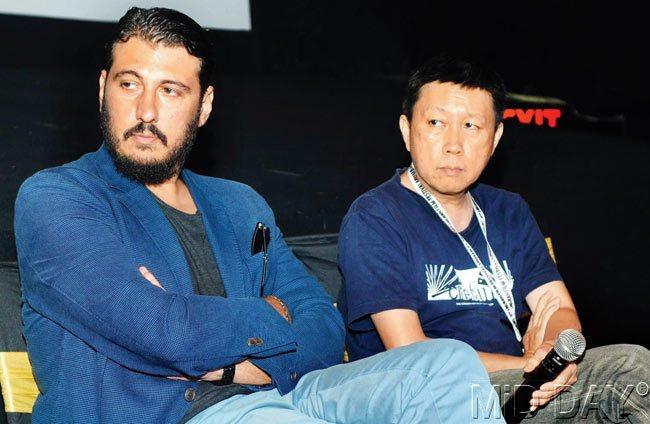 Producer-director Ioakim Mylonas with film critic Philip Cheah on  day five of the fifth edition of Jagran Film Festival at Cinemax,  Andheri on Friday
