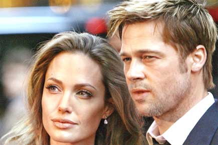 Angelina Jolie spotted smoking after 'fuming row' with hubby Brad Pitt