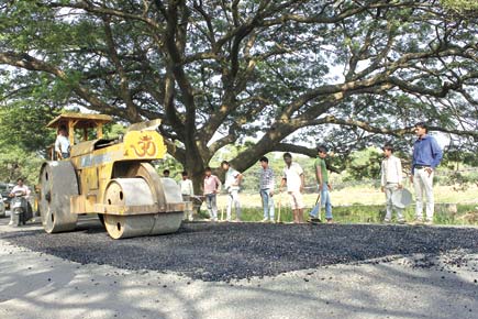 In pothole-ridden Aarey Colony: 'Road will only be repaired when GMLR work begins'
