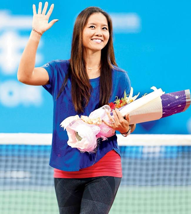 Li Na acknowledges the crowd at her retirement ceremony during the Wuhan Open at Optics Valley International Tennis Center on Tuesday. Pics/Getty Images