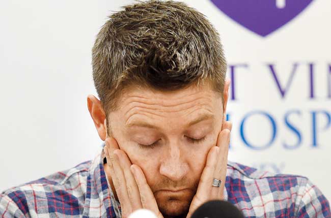 Shattered: Australian skipper Michael Clarke at a press conference in Sydney. Pic/AFP