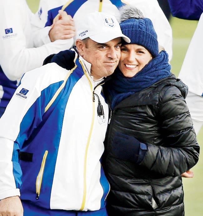 Europe captain Paul McGinley is greeted by his wife Allison