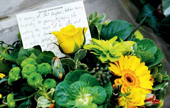 Floral tributes paid to Phil Hughes at the Lord
