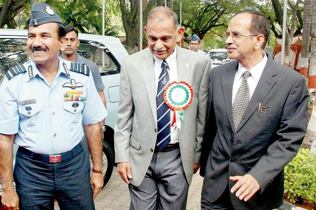 Air Chief Marshal Arup Raha (L), former Air Marshal BU Chengappa (C) and chairman HAL RK Thyagi (R) in Bengaluru. piC/PTI