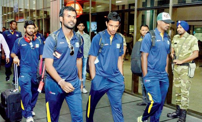 Sri Lanka players arrive in Ahmedabad yesterday for the second ODI on November 6. Pic/PTI
