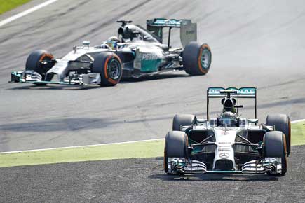 Hamilton wins Italian GP, cuts teammate Rosberg's lead