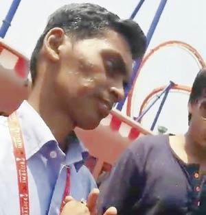 The employee wearing the Adlabs ID card was caught on camera trying to sell tickets at a higher price