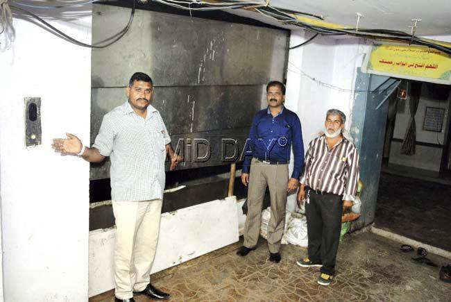 Shop owners show the lift’s exit in the basement car park, which they cannot use any more. Pics/Rane Ashish