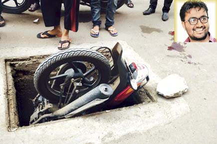 Biker sustains severe injuries as manhole cover gives way