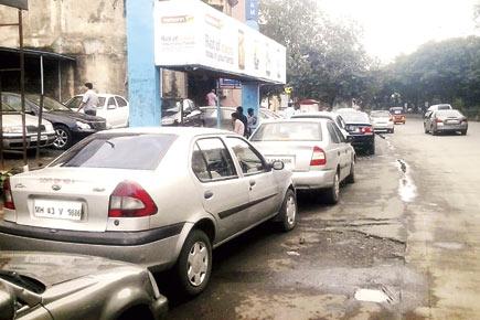Palm Beach Road: Car dealers openly flout no-parking rules