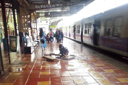 Newly installed tiles come loose at Charni Road