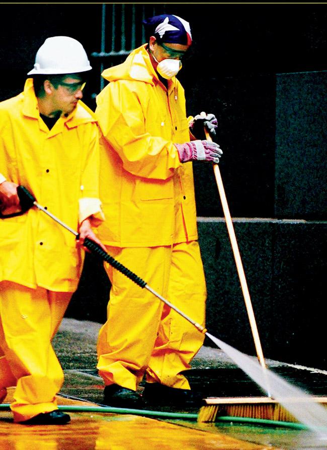 Civic officials cleaning Ground Zero after the terror attack
