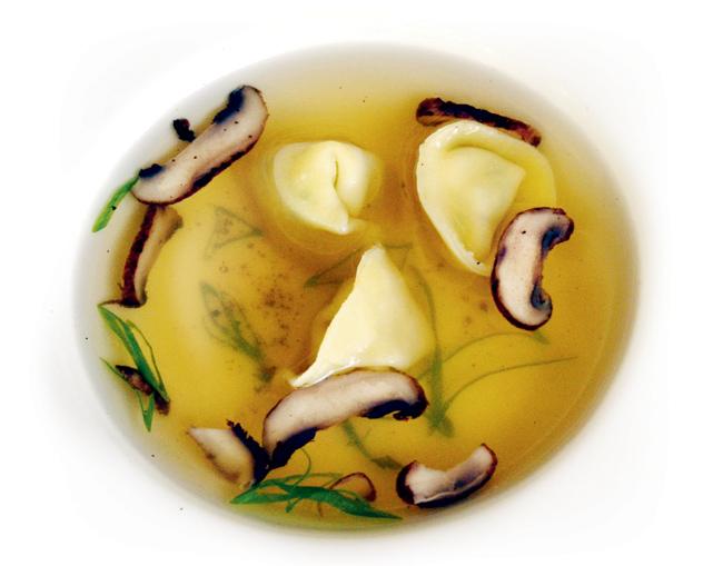 The looks of the Consommé of Chicken might be deceptive. This simple-looking, clear soup actually takes eight hours to cook and is one of the healthiest, low calorie dishes on their menu.