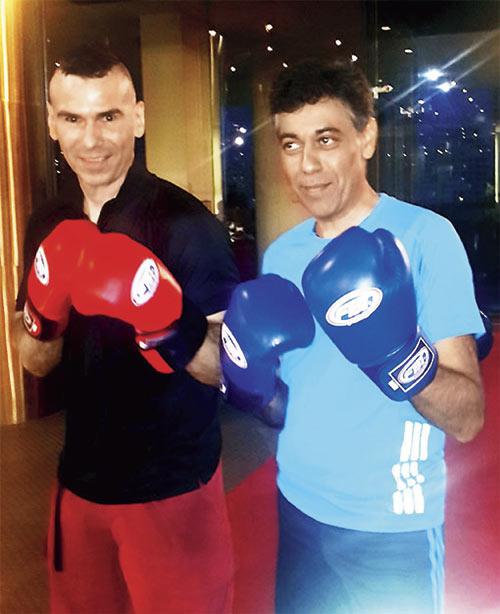 Deepak Ohri with his trainer