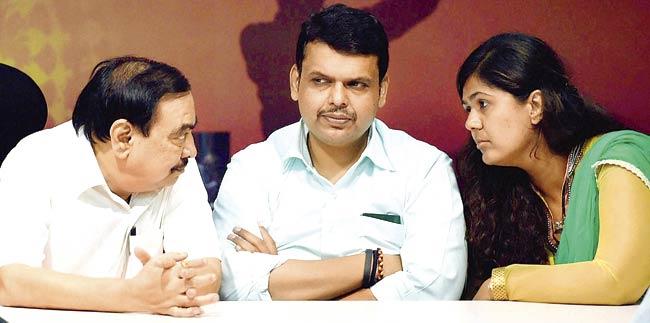 BJP leaders Eknath Khadse, Devendra Fadnavis and Pankaja Munde during a press conference to announce the split yesterday. Pic/PTI