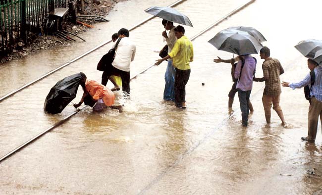 Flooded tracks at Kurla station is a common phenomenon during every monsoon. File pic