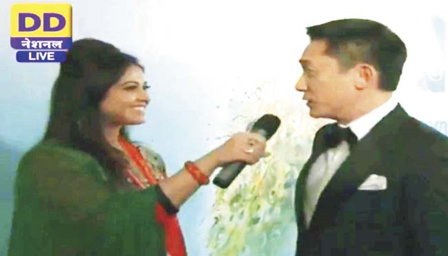 The journalist wasn’t speaking Chinese but the look on Tony Leung’s face suggests she did