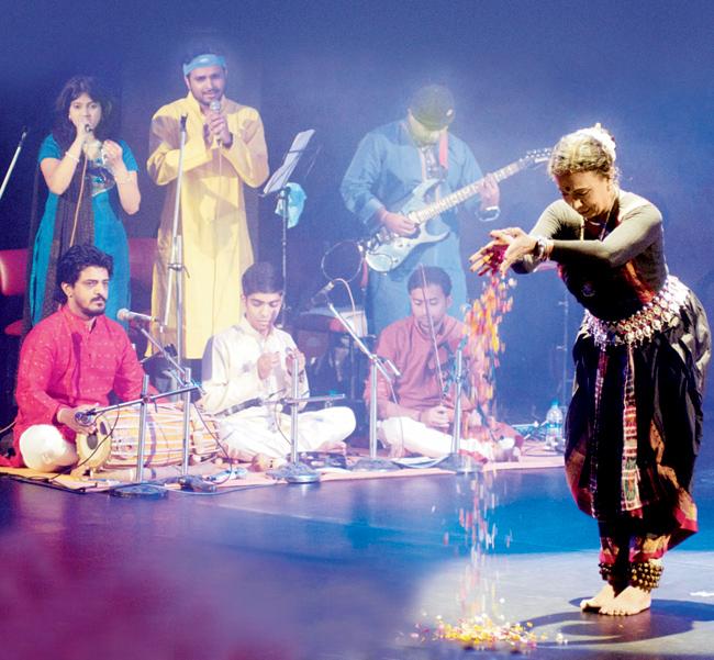 Jhelum Paranjape (right) and her son Bunkim (standing, in yellow) at the NCPA Mudra Dance Festival this yearJhelum Paranjape (right) and her son Bunkim (standing, in yellow) at the NCPA Mudra Dance Festival this year