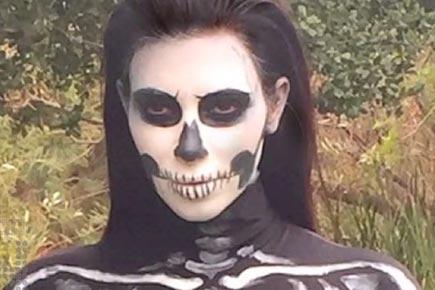 Kim Kardashian dresses as Anna Wintour for Halloween