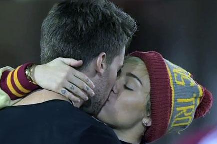 Miley Cyrus gets intimate with Patrick Schwarzenegger, Arnold Schwarzenegger reacts!
