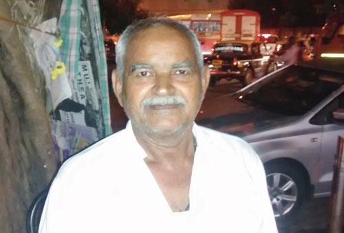 Ramchandar Jaiswal at his paan shop in Matunga