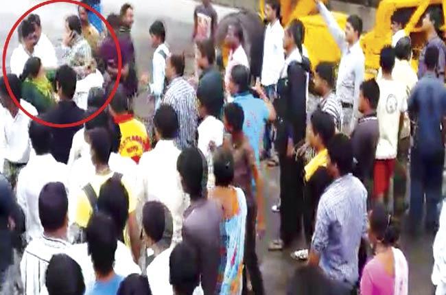 In the video, Dahisar corporator Sheetal Mhatre can be seen slapping one person and grabbing another by the collar