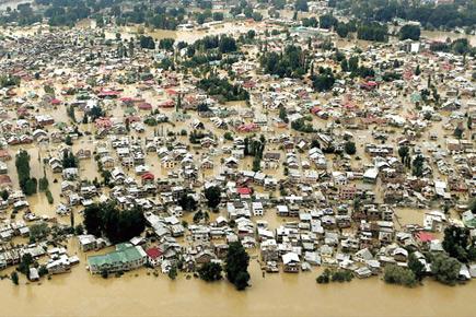 Over 76,500 evacuated in flood-hit Kashmir