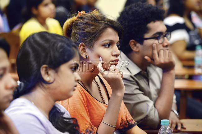 The students are absorbed in the discussion