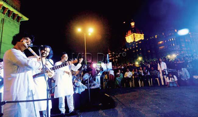 A group of 25 musicians performed opposite the Taj Mahal hotel, whose burning spires became the most visible symbol of the attacks as a memorial to those slain in 26/11. Pic/Sameer Markande