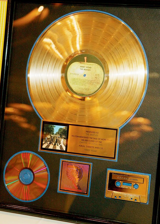 The Beatles gold record award for Abbey Road is displayed during the Fest for Beatles Fans 2007 at the Mirage Hotel & Casino Las Vegas, Nevada