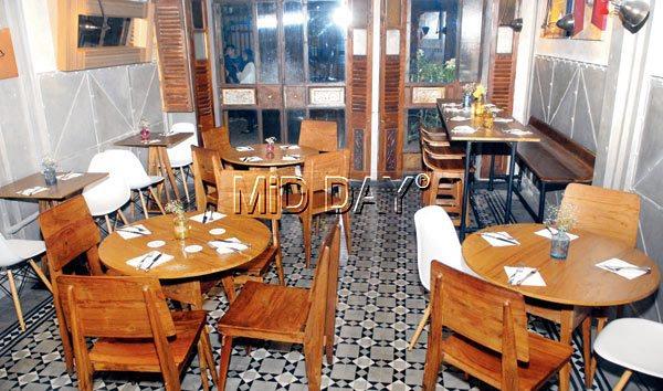 The café gives off a warm vibe through its casual, comfortable interiors, done up with wooden chairs and tables, topped with jars of fresh plant. pics/ shadab khan