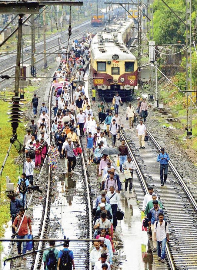 On Tuesday, there was a Unit failure in a local train, which left it stranded between Sewri and Cotton Green stations on the Harbour line, forcing people to get off and walk on the tracks. File pic for representation
