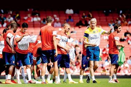 It's time to step up, Wenger tells team