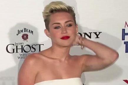 Miley Cyrus with Patrick, 'Wrecking Ball' singer confesses!