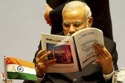 When Sharif walks for speech, Modi reads newspaper