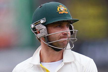 Phil Hughes battles for life after being struck on the head by a bouncer