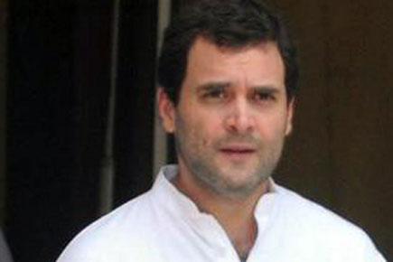 Rahul Gandhi leads opposition to protest minister's abuse   