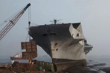 India's first aircraft carrier INS Vikrant being broken up