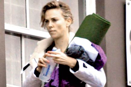 Charlize Theron takes up hot yoga