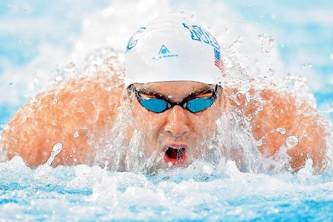 Michael Phelps competes in the 100m butterfly event on Friday. Pic/PTI