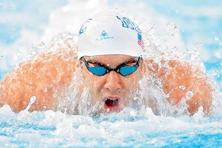 Michael Phelps settles for silver in 100m butterfly
