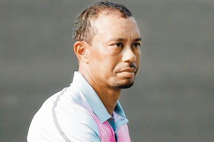 Tiger Woods misses cut as back pain worsens